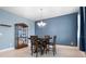 Bright dining room with hardwood floors and chandelier at 6275 Hamlin Reserve Blvd, Winter Garden, FL 34787