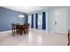 Bright dining room with hardwood floors and chandelier at 6275 Hamlin Reserve Blvd, Winter Garden, FL 34787
