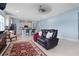 Open concept Gathering room with kitchen and access to backyard at 6275 Hamlin Reserve Blvd, Winter Garden, FL 34787