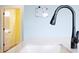 Modern kitchen sink with elegant faucet and white countertop at 6275 Hamlin Reserve Blvd, Winter Garden, FL 34787