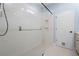 Spacious walk-in shower with glass enclosure and built-in shelving at 6275 Hamlin Reserve Blvd, Winter Garden, FL 34787