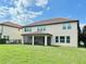 Two story home with a large backyard and screened porch at 8426 Morehouse Dr, Orlando, FL 32836