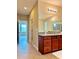 Double vanity bathroom with granite countertop at 8426 Morehouse Dr, Orlando, FL 32836
