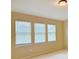 Bedroom with three windows and neutral wall color at 8426 Morehouse Dr, Orlando, FL 32836