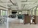Spacious clubhouse with kitchen, lounge, and game area at 8426 Morehouse Dr, Orlando, FL 32836