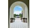 Archway view of community landscape and fountain at 8426 Morehouse Dr, Orlando, FL 32836