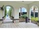 Covered walkway offering views of community landscape at 8426 Morehouse Dr, Orlando, FL 32836