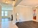 Dining room with hardwood floors and access to kitchen at 8426 Morehouse Dr, Orlando, FL 32836