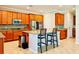 Spacious kitchen with island and stainless steel appliances at 8426 Morehouse Dr, Orlando, FL 32836
