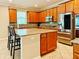 Modern kitchen with ample cabinetry and granite countertops at 8426 Morehouse Dr, Orlando, FL 32836