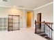 Spacious loft area with carpeted floor and plenty of natural light at 8426 Morehouse Dr, Orlando, FL 32836