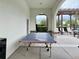 Outdoor ping pong table near the pool area at 8426 Morehouse Dr, Orlando, FL 32836