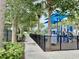 playground with shade structures and walking path at 8426 Morehouse Dr, Orlando, FL 32836