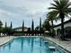 Expansive pool area with lounge chairs and water features at 8426 Morehouse Dr, Orlando, FL 32836