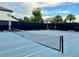 Well-maintained tennis court with new net at 8426 Morehouse Dr, Orlando, FL 32836