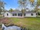 Single story home with large backyard and screened porch at 790 Silhouette Ct, Longwood, FL 32750