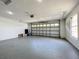 Garage with automatic opener and window at 790 Silhouette Ct, Longwood, FL 32750