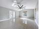 Bright living room with tile floors and ceiling fan at 790 Silhouette Ct, Longwood, FL 32750