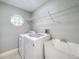 Laundry room with washer, dryer, and utility sink at 790 Silhouette Ct, Longwood, FL 32750