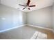 Bright bedroom with ceiling fan and tile floors at 790 Silhouette Ct, Longwood, FL 32750