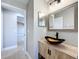 Modern bathroom with vessel sink and access to bedroom at 790 Silhouette Ct, Longwood, FL 32750
