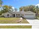 Newly renovated single-Gathering home with a two-car garage and landscaped lawn at 790 Silhouette Ct, Longwood, FL 32750