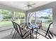 Sunroom with glass windows and view of canal at 790 Silhouette Ct, Longwood, FL 32750