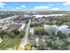 Aerial view of the property highlighting its proximity to water and neighborhood at 790 Silhouette Ct, Longwood, FL 32750