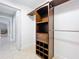 Walk-in closet with custom shelving and access to another room at 790 Silhouette Ct, Longwood, FL 32750