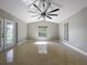 Bright living room with tile floors and ceiling fan at 790 Silhouette Ct, Longwood, FL 32750