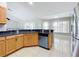 Modern kitchen with granite countertops and stainless steel appliances at 790 Silhouette Ct, Longwood, FL 32750