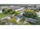 An aerial view showcasing the property's position near a lake and nearby businesses at 790 Silhouette Ct, Longwood, FL 32750