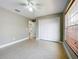 Bright bedroom with tile floors, large closet, and window blinds at 790 Silhouette Ct, Longwood, FL 32750