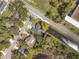 Aerial view showing home's position on a corner lot near water at 790 Silhouette Ct, Longwood, FL 32750