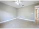 Simple bedroom with tile flooring and neutral wall colors at 790 Silhouette Ct, Longwood, FL 32750