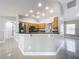 Kitchen with stainless steel appliances and breakfast bar at 790 Silhouette Ct, Longwood, FL 32750