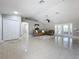 Spacious living room with tile floors, vaulted ceiling, and lots of natural light at 790 Silhouette Ct, Longwood, FL 32750