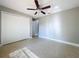 Bright bedroom with tiled floors and double doors at 790 Silhouette Ct, Longwood, FL 32750