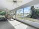 Spacious screened porch overlooking canal, with seating for six at 790 Silhouette Ct, Longwood, FL 32750