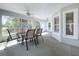 Bright screened porch with table and chairs, great for entertaining at 790 Silhouette Ct, Longwood, FL 32750