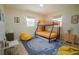 bedroom featuring a bunk bed and playful decor at 315 E St, Lake Wales, FL 33853