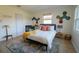 Second bedroom with a full-size bed and crib at 315 E St, Lake Wales, FL 33853