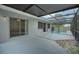 Screened-in pool area with patio and covered lanai at 115 N Lakewood Cir, Maitland, FL 32751