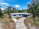 Charming single story home with a curved driveway at 115 N Lakewood Cir, Maitland, FL 32751