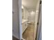 Main bathroom with a tub, toilet and vanity at 3615 Davenport Creek Ct, Kissimmee, FL 34746