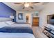 Main bedroom with a king-size bed and access to the closet at 168 Taft Dr, Davenport, FL 33837