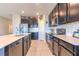 Modern kitchen with stainless steel appliances and an island at 168 Taft Dr, Davenport, FL 33837
