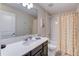Bathroom with tub, shower, and updated vanity at 168 Taft Dr, Davenport, FL 33837