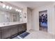 Double vanity bathroom with a walk-in shower at 168 Taft Dr, Davenport, FL 33837