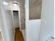 Clean bathroom featuring a walk-in shower and updated flooring at 6225 Centennial Dr, Orlando, FL 32808